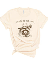 Load image into Gallery viewer, This is my 2nd Rodeo Cowboy Racoon Graphic Tee | Multiple Colors - Elevated Boutique CO
